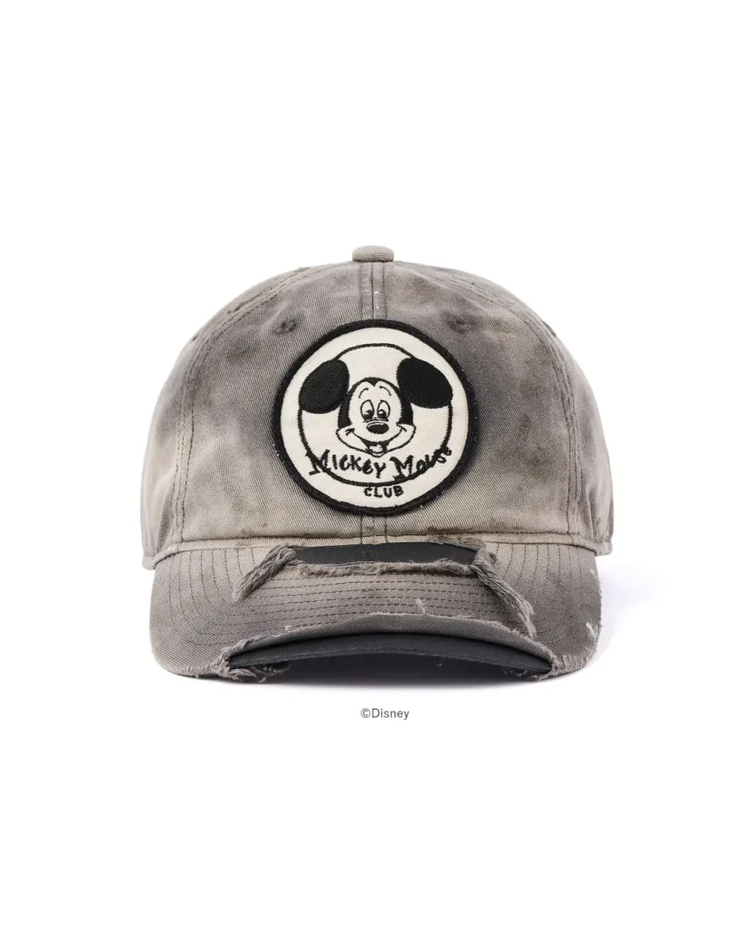 Distressed gray baseball cap with a Mickey Mouse Club patch and frayed brim, centered on a white background