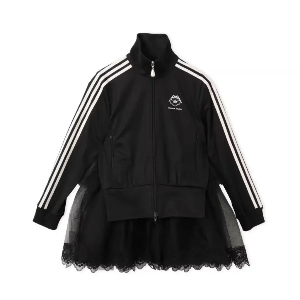 Black zip-up track jacket with three white sleeve stripes, paired with a black lace-trimmed skirt on white background