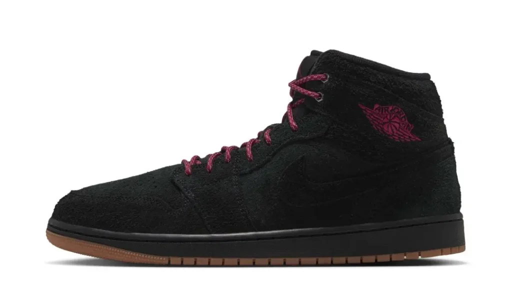 Black high-top sneaker with burgundy laces and winged basketball logo, shown in side profile on a white background