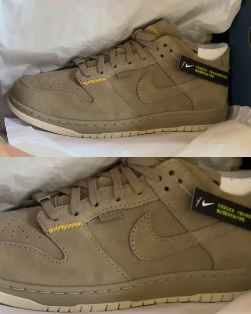 Close-up of a tan Nike sneaker with perforated toe, matching laces, yellow stitching, and a black tag in tissue paper