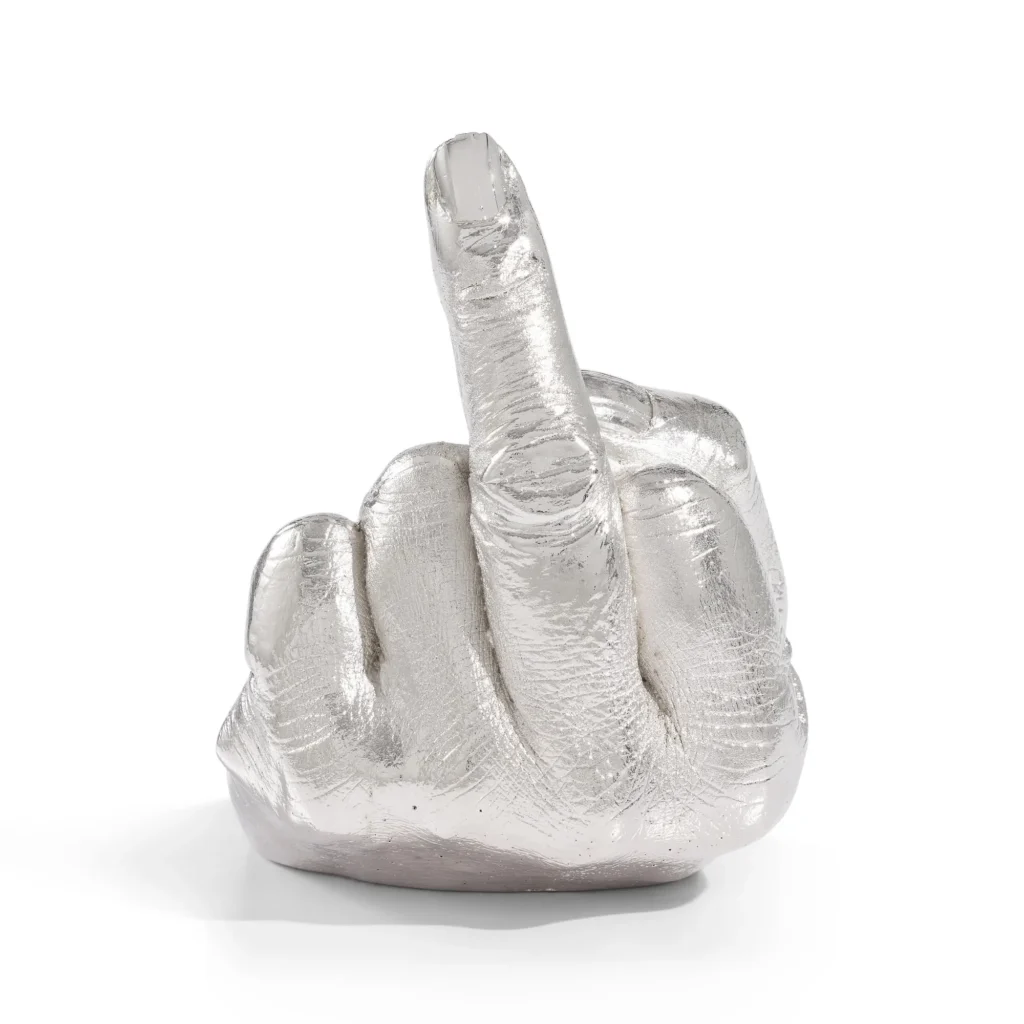 Translucent silver glass sculpture of a clenched fist with the middle finger raised, isolated on white background