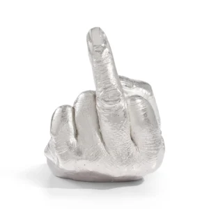 Translucent silver glass sculpture of a clenched fist with the middle finger raised, isolated on white background