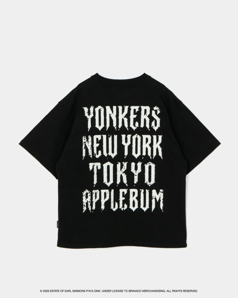Black T-shirt with distressed white text reading Yonkers, New York, Tokyo, and Applebum on a light background