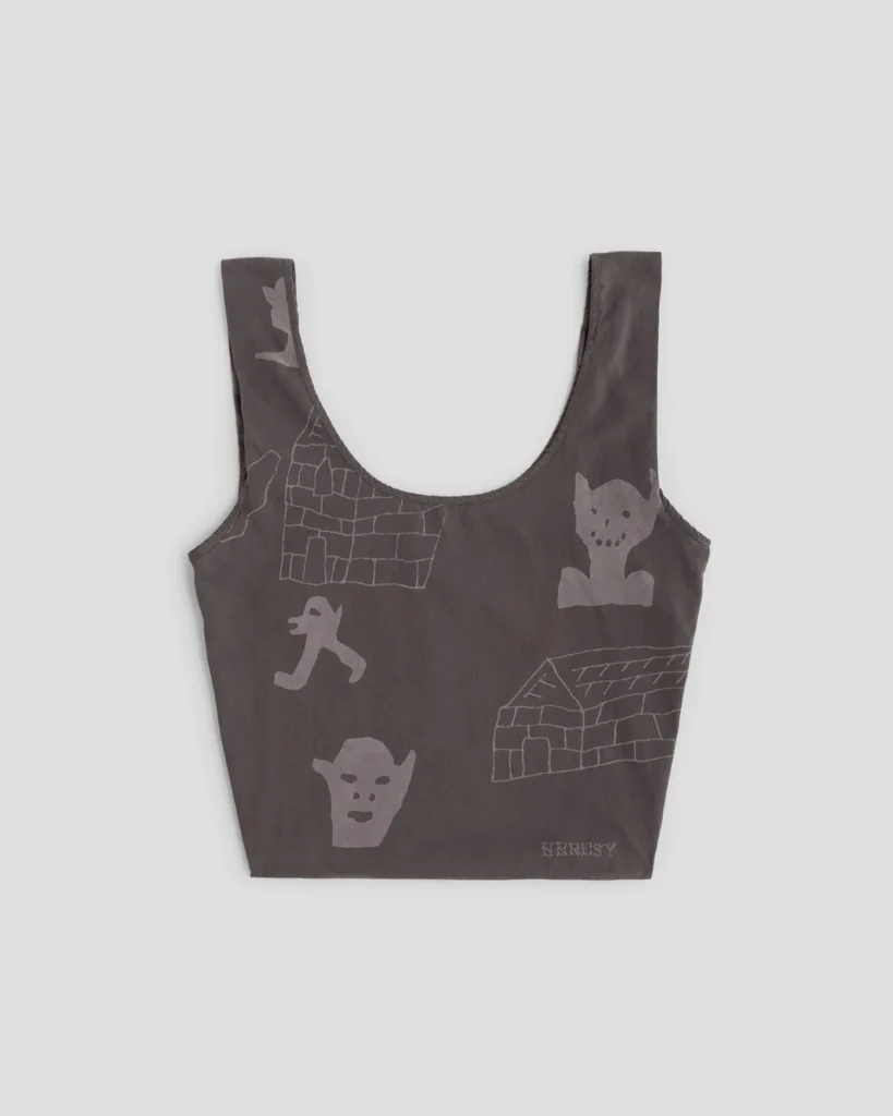Dark brown sleeveless tote bag with gray goblin figures and brick wall illustrations, photographed against a light background