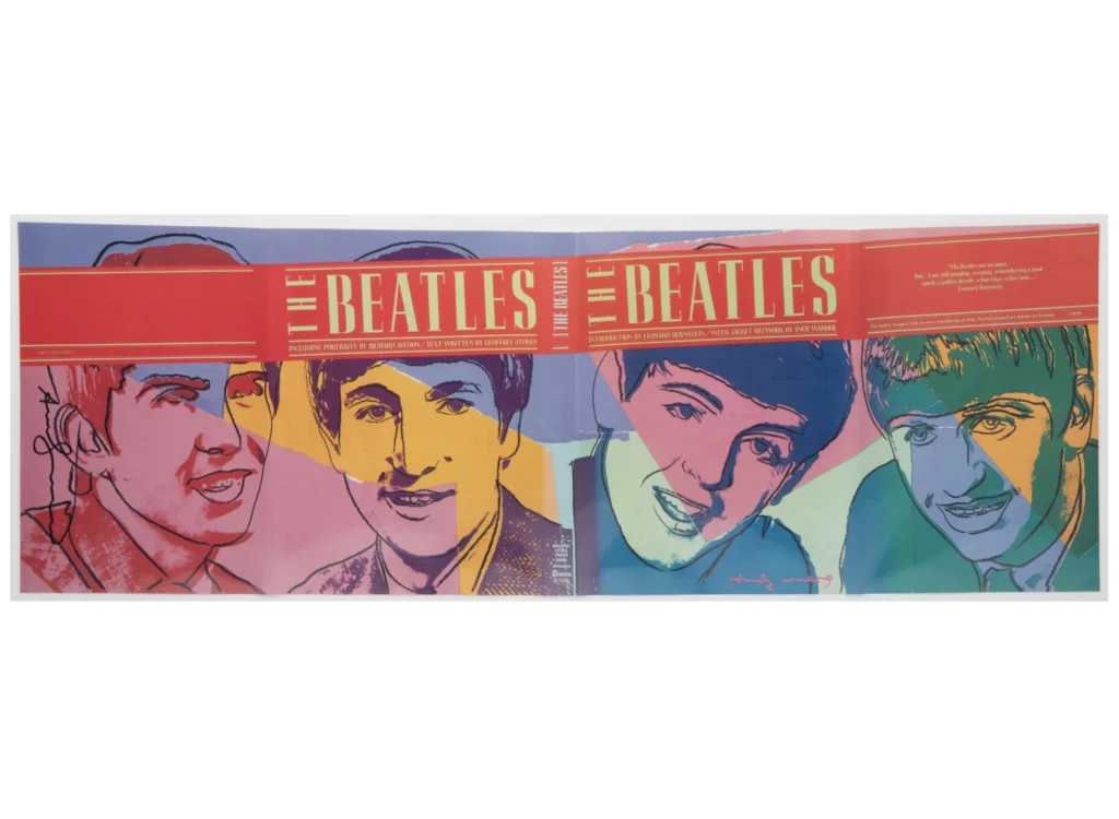 Open magazine spread with colorful illustrated portraits of four men beneath a red banner reading “The Beatles”