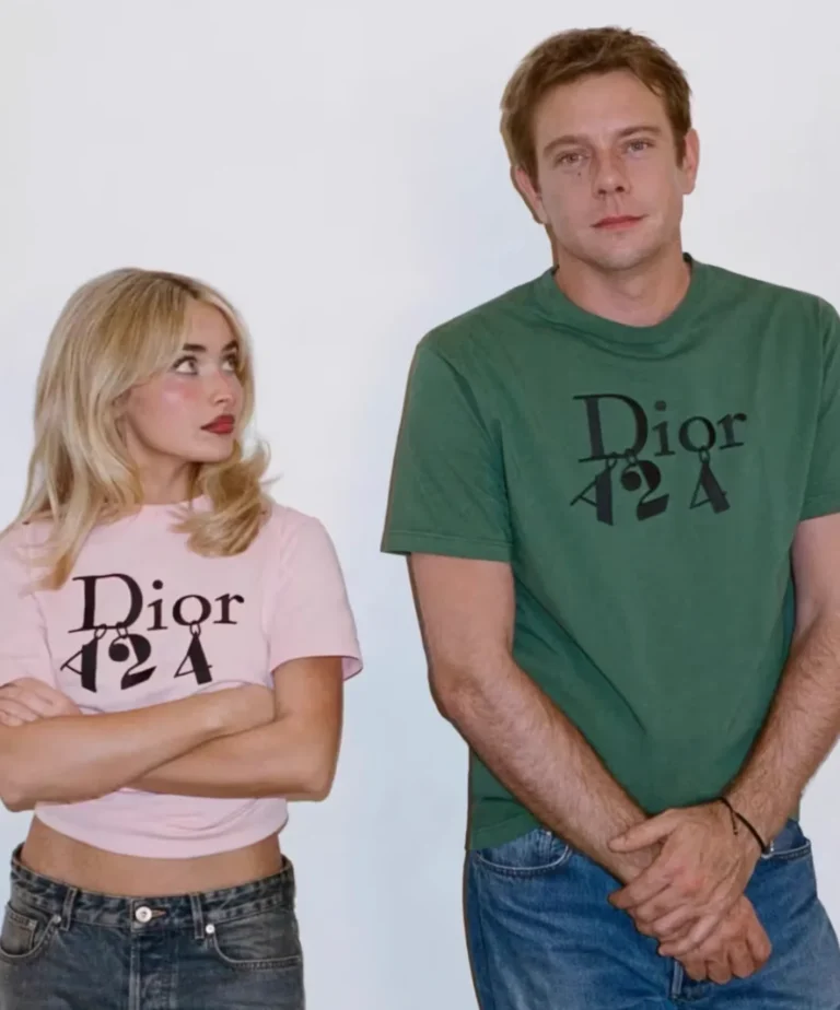 Sabrina Carpenter in a pink Dior Tee stands with folded arms beside Jonathan Andersonm in a green Dior Tee against a white background