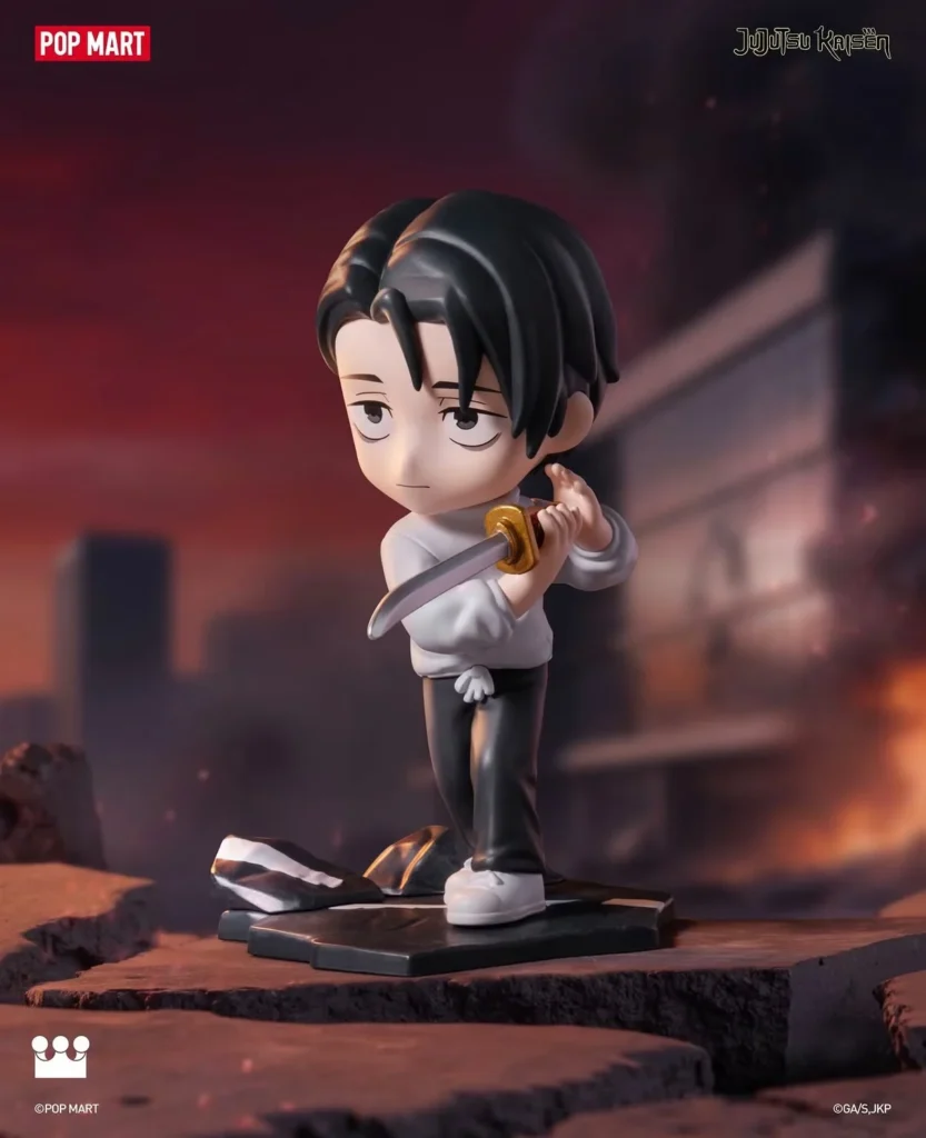 Chibi figure with black hair grips a silver sword, standing on rubble in a white shirt and black pants