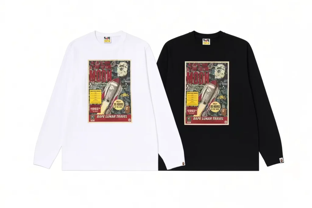 White and black long-sleeve shirts with matching vintage space-themed graphics, laid flat against a white background