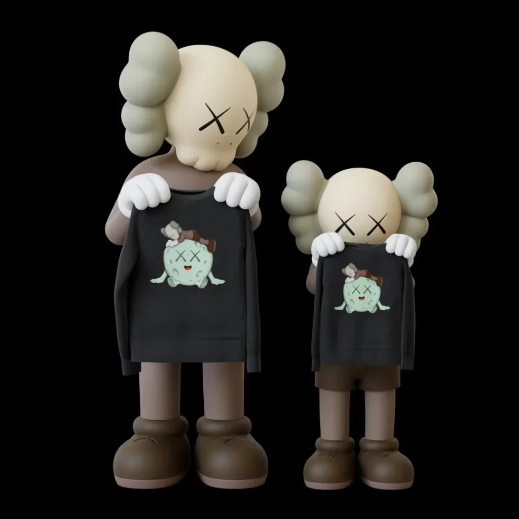 Two KAWS figures hold black shirts featuring a mint-green cartoon character, posed against a black background