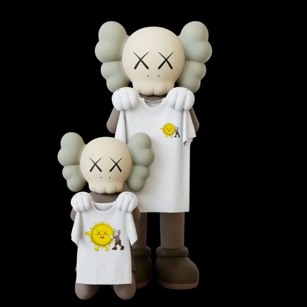 Two KAWS figures with crossed-out eyes hold white T-shirts featuring a yellow sun graphic against a black background