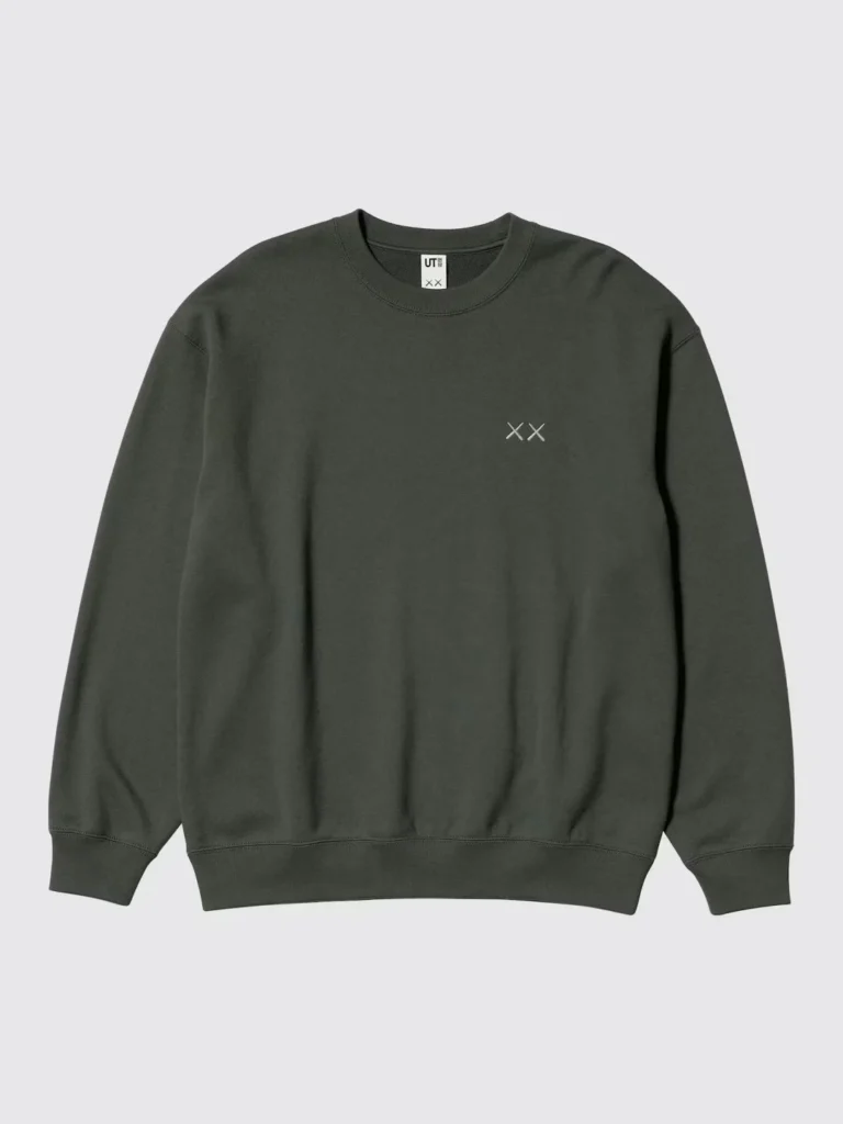 Dark gray crewneck sweatshirt with ribbed cuffs and hem, featuring a small white XX logo on the chest against a light