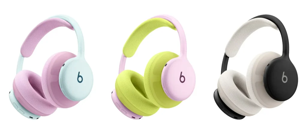 Three pairs of Beats over-ear headphones in pastel pink and blue, lime and pink, and black and cream on white background