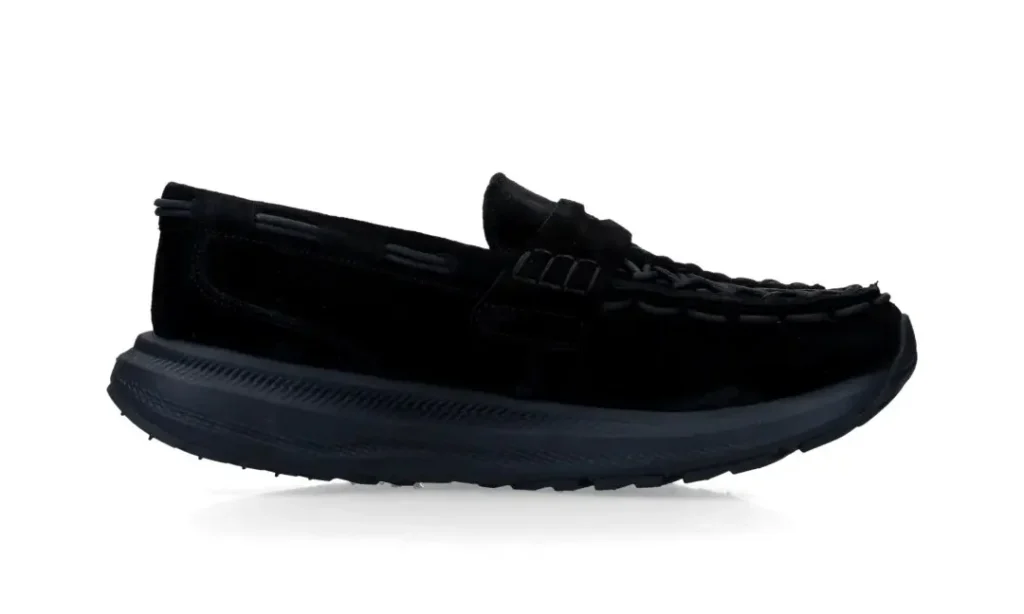 Black suede KEEN UNEEK loafer with braided upper and thick textured sole on white background