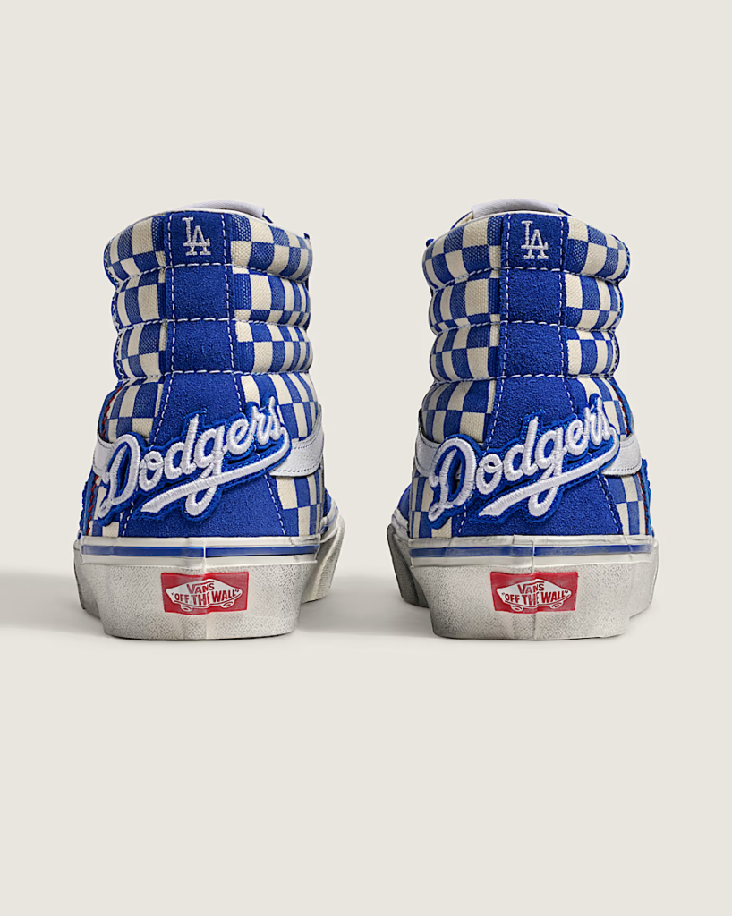 Pair of blue-and-white checkered high-top sneakers with Dodgers script and LA logos facing forward