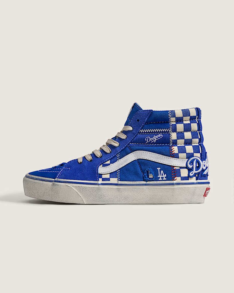 Blue-and-white Vans high-top sneaker with Dodgers branding and checkerboard panels