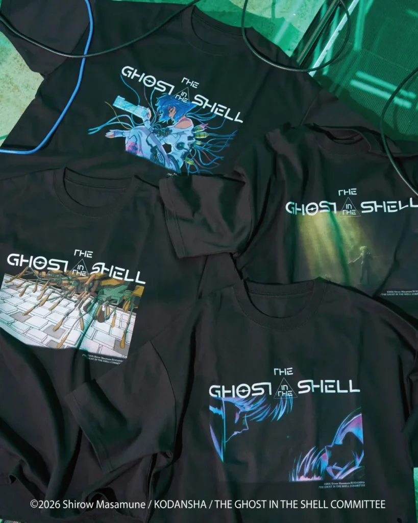 Several black graphic T-shirts arranged together, featuring colorful Ghost in the Shell anime artwork and white lettering