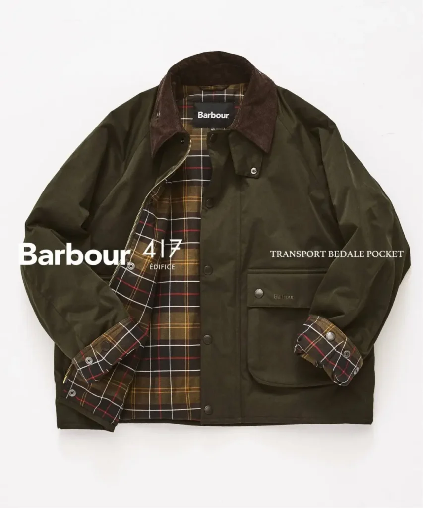 Olive waxed Barbour jacket laid flat, with brown corduroy collar, tartan lining and sleeves, and flap pockets on white
