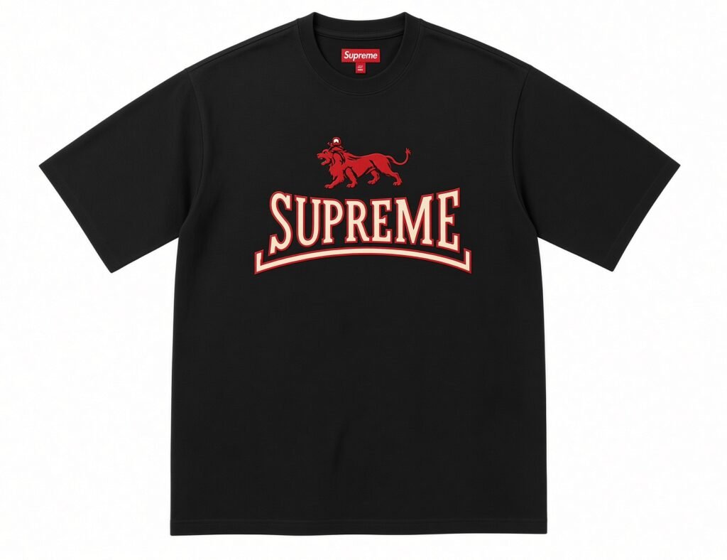 Black Supreme T-shirt with red-and-cream arched logo and lion graphic, laid flat against a white background