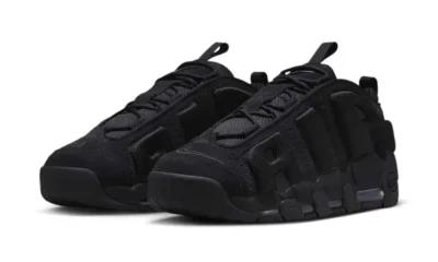 Pair of black trail sneakers with rugged segmented soles and pull tabs, arranged against a white background