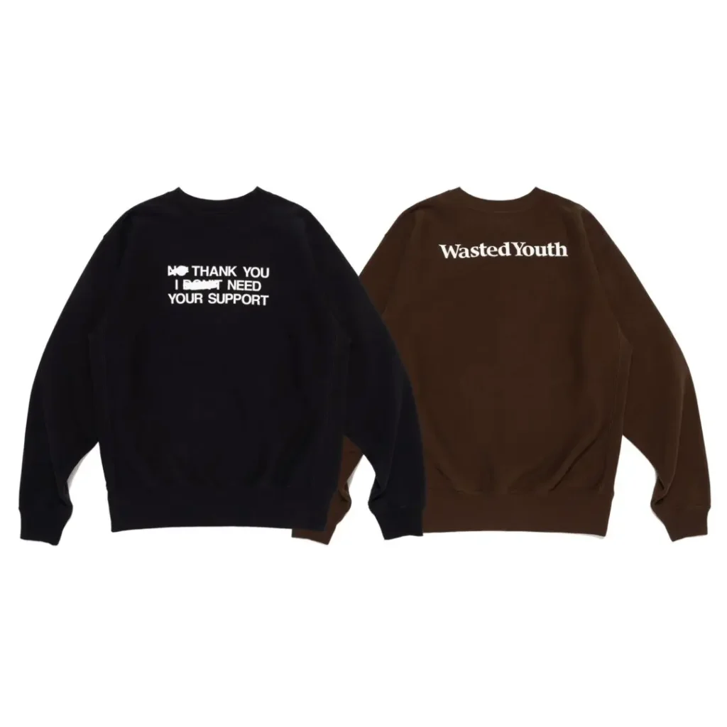 Black and brown crewneck sweatshirts with white text displayed side by side on a white background