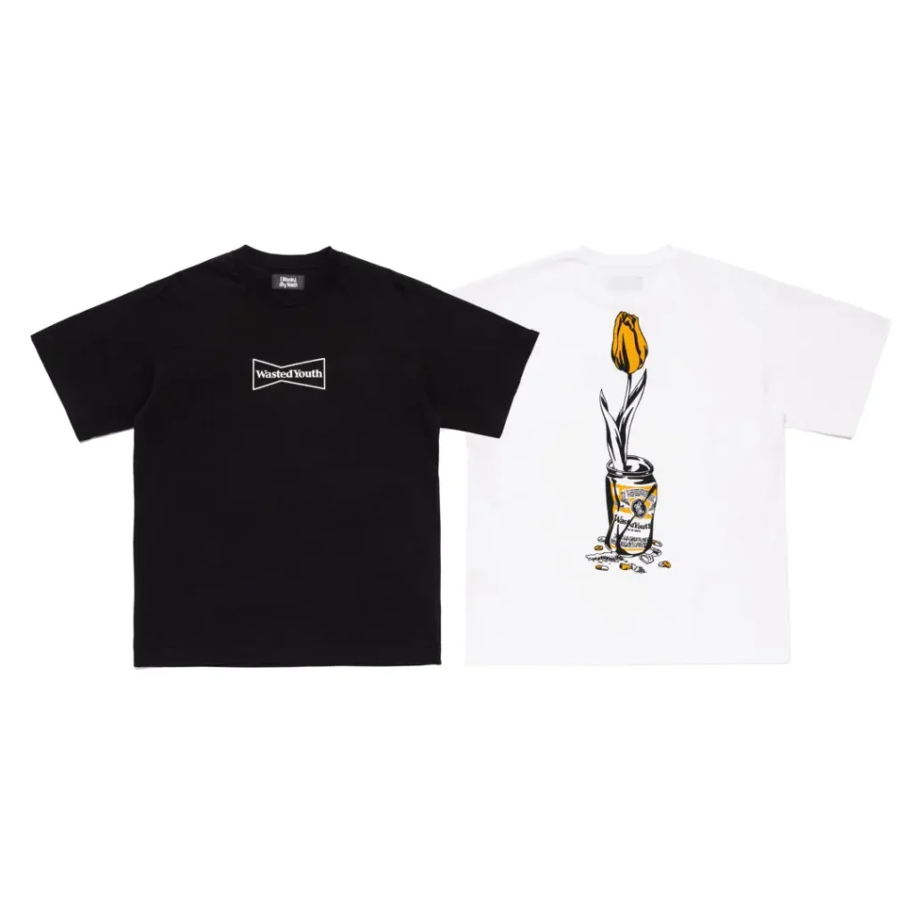 Black and white graphic T-shirts, one with a small chest logo and the other with a flower illustration