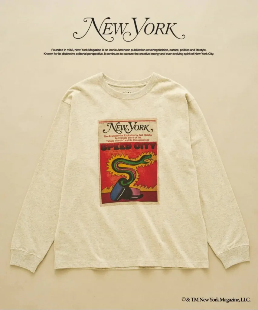 Cream long-sleeve shirt featuring a red New York Magazine cover graphic with a green snake, on a beige background
