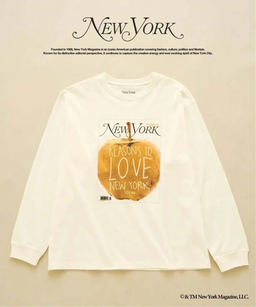 White long-sleeve T-shirt featuring a New York magazine cover graphic with an orange and “Reasons to Love New York” text