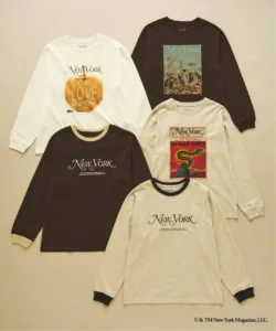 Five New York long-sleeve shirts in white, black and cream, arranged flat on a beige background with graphic prints and logos