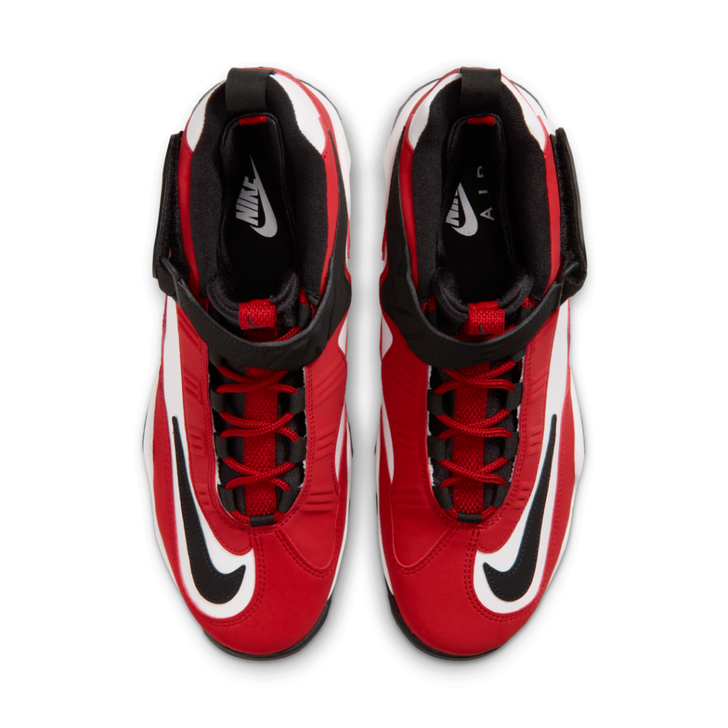 Top view of a pair of red, black, and white Nike high-top sneakers side by side