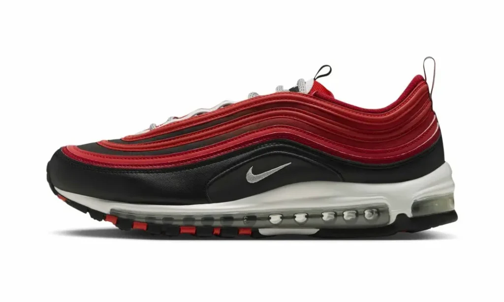 Side view of a black, red, and white Nike Air Max 97 sneaker on a white background