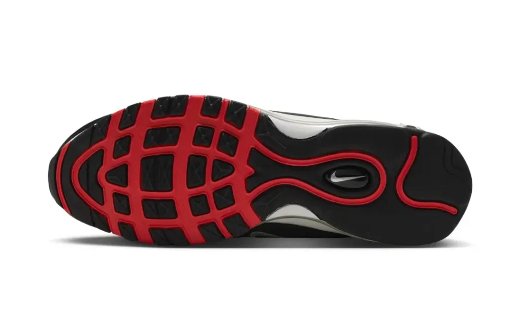 Black and red athletic shoe sole shown from below against a white background