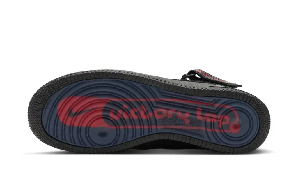 Black Nike Air Force 1 Mid outsole with red Victory Lap Radio lettering and circular graphics