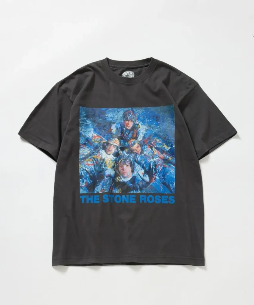 Black T-shirt featuring a colorful graphic of The Stone Roses and blue text reading “THE STONE ROSES”