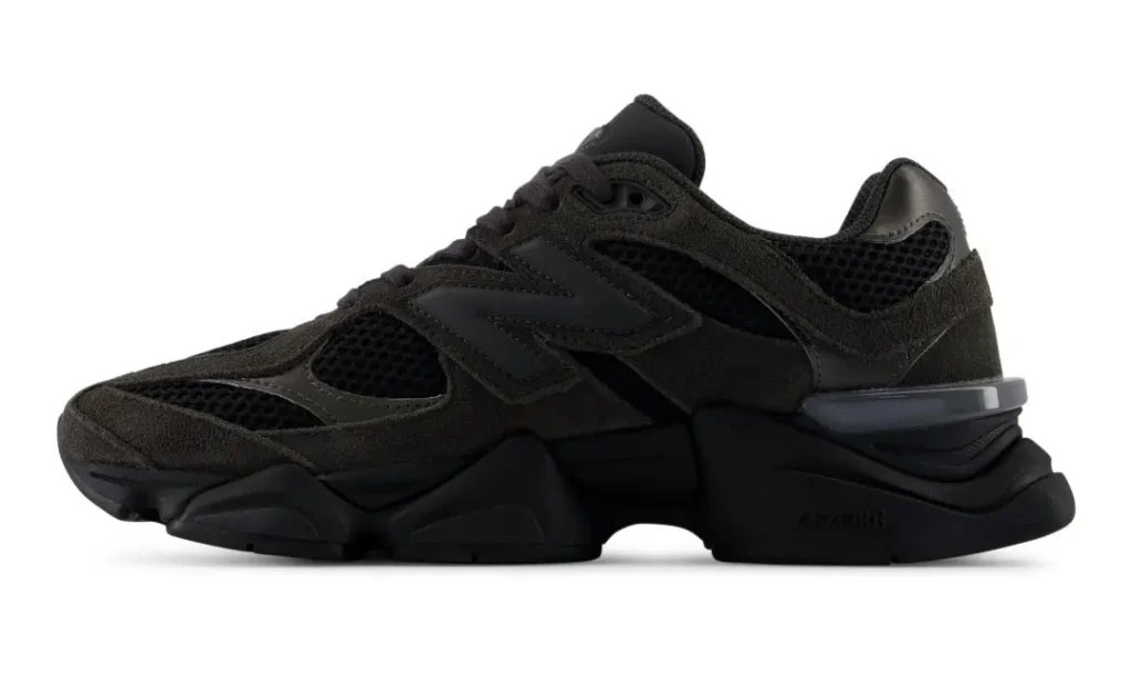 Black and Neptune grey New Balance 9060 sneaker on a white background, shown in side profile