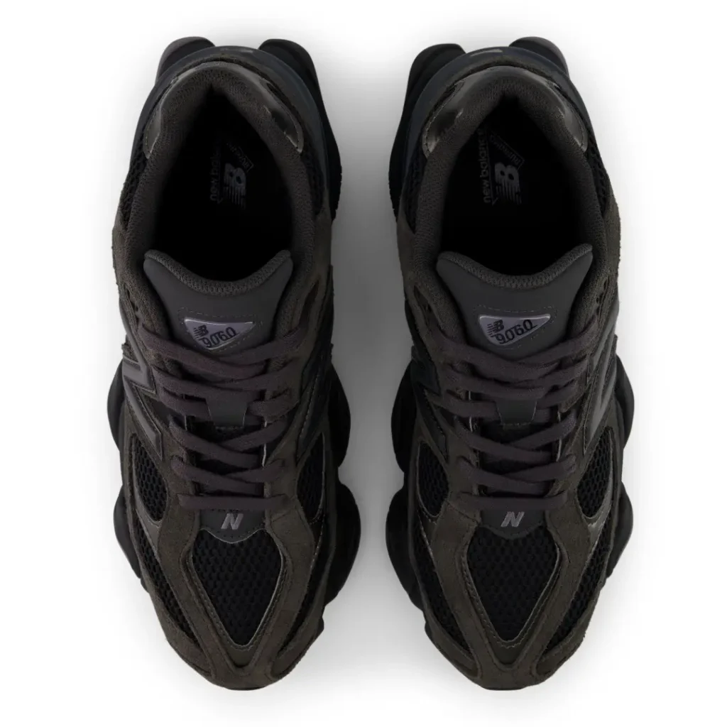 Top view of black and dark gray New Balance 9060 sneakers side by side