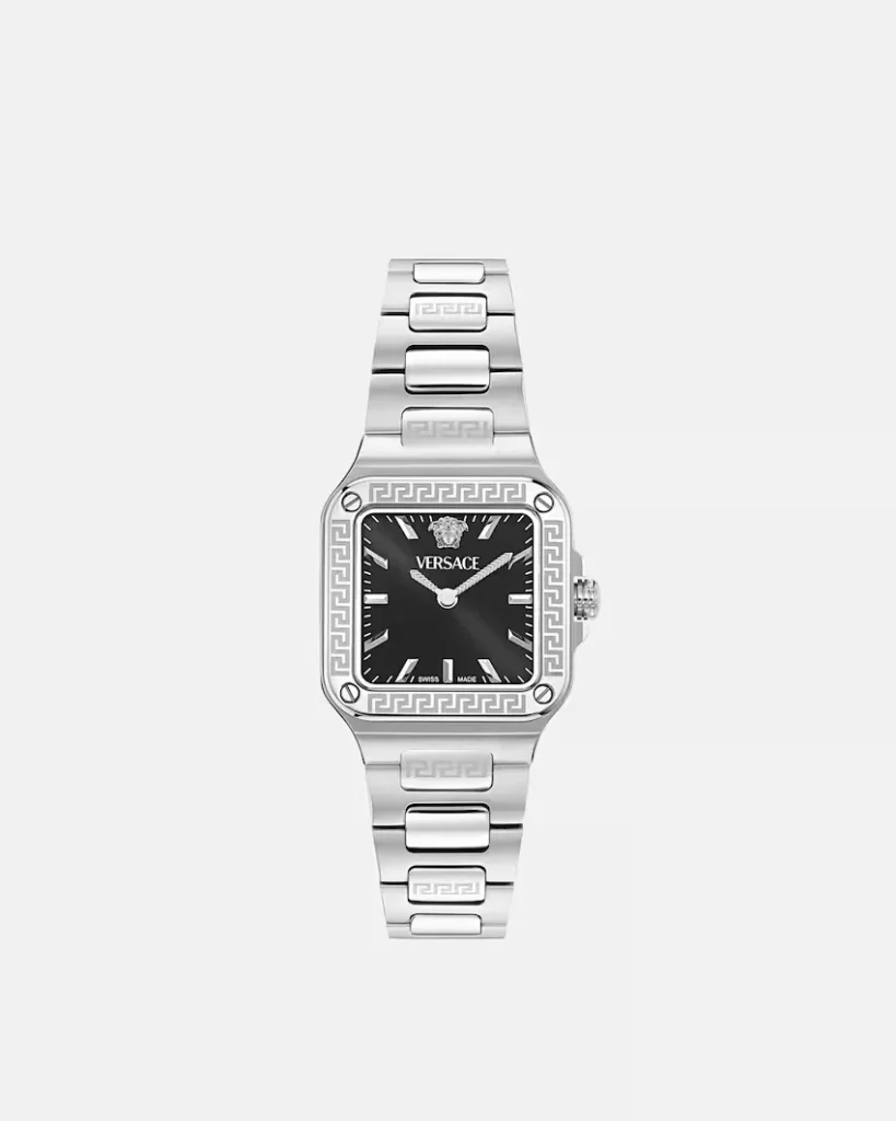 Silver-tone Versace watch with a black square dial, Greek-key bezel, and matching metal bracelet on a white background