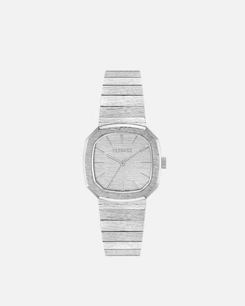 Silver Versace wristwatch with a rectangular textured case, matching bracelet, and pale dial with logo