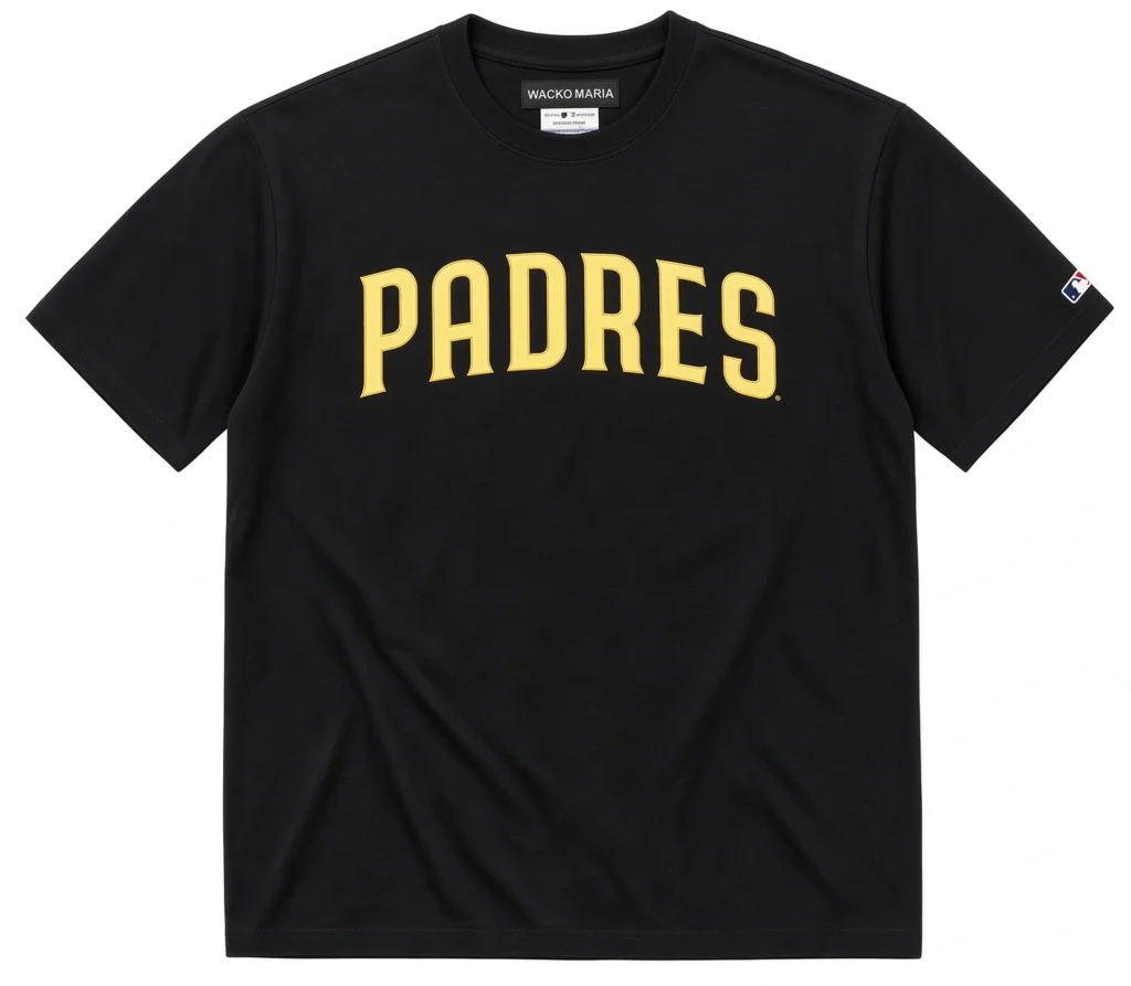 Black Padres T-shirt with gold lettering and an MLB sleeve patch, laid flat against a white background