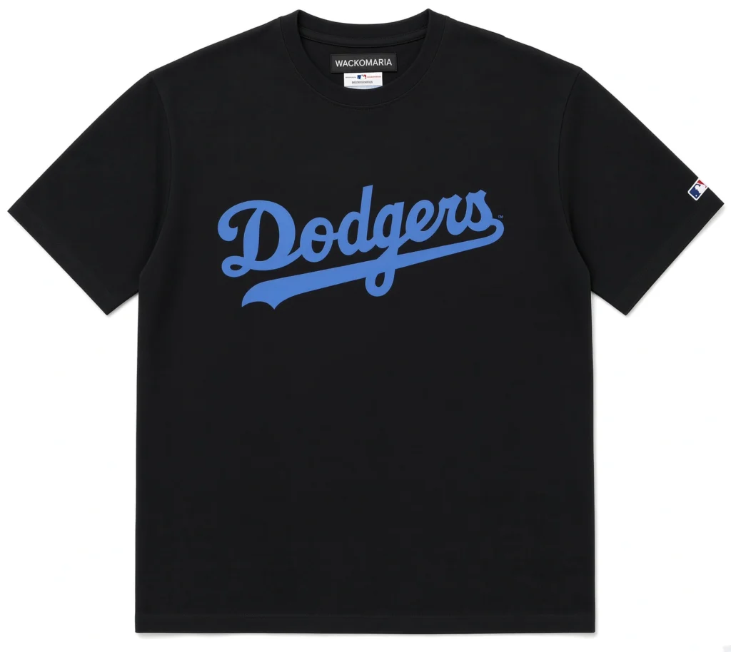 Black T-shirt with blue Dodgers script across the chest and a small MLB patch on the sleeve, displayed on white background