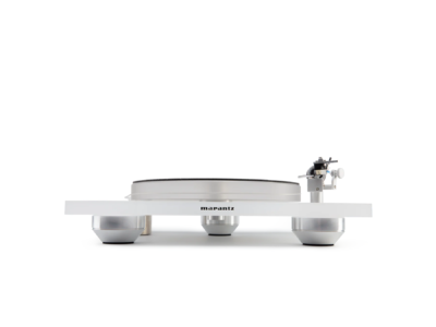 Front view of a white Marantz turntable with exposed silver feet, platter, and tonearm against a white background