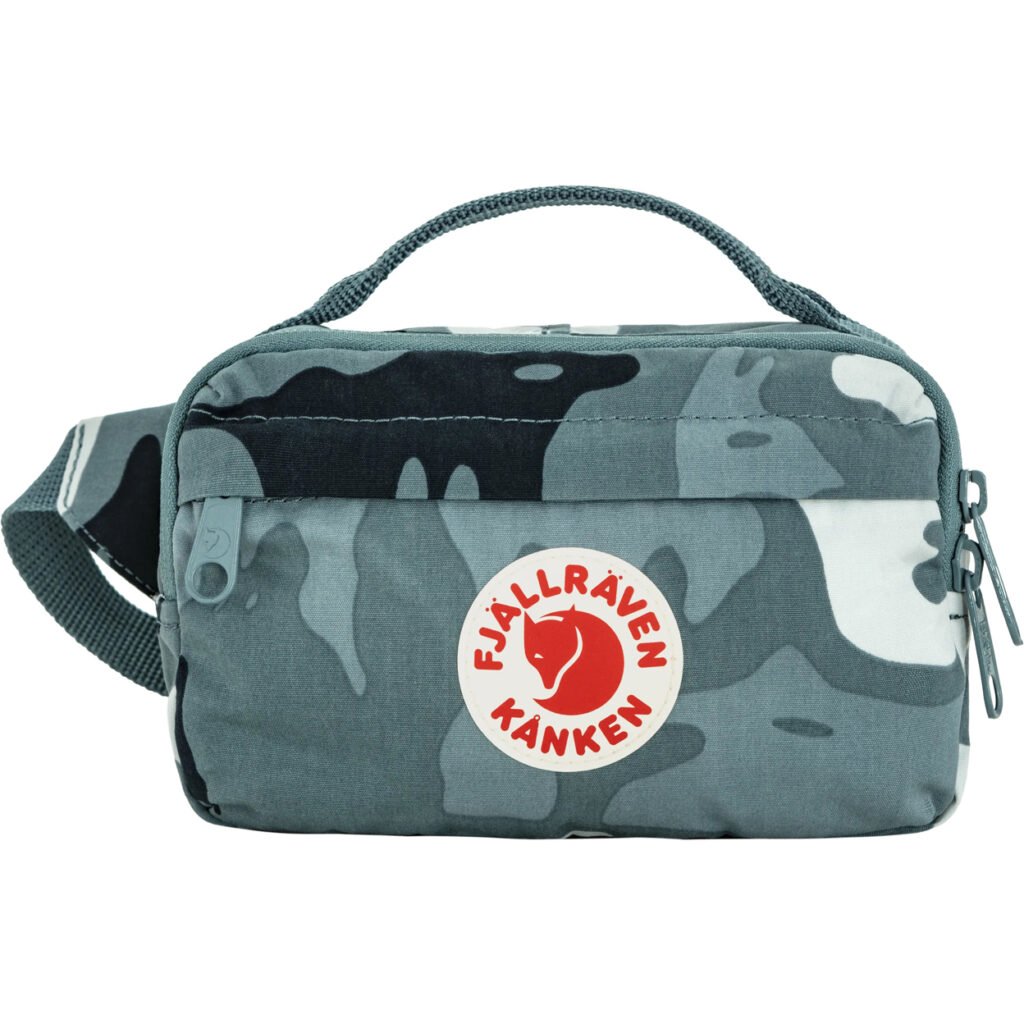 Blue-gray camouflage Fjällräven Kånken hip pack with top handle, adjustable strap, front pocket and logo patch on white