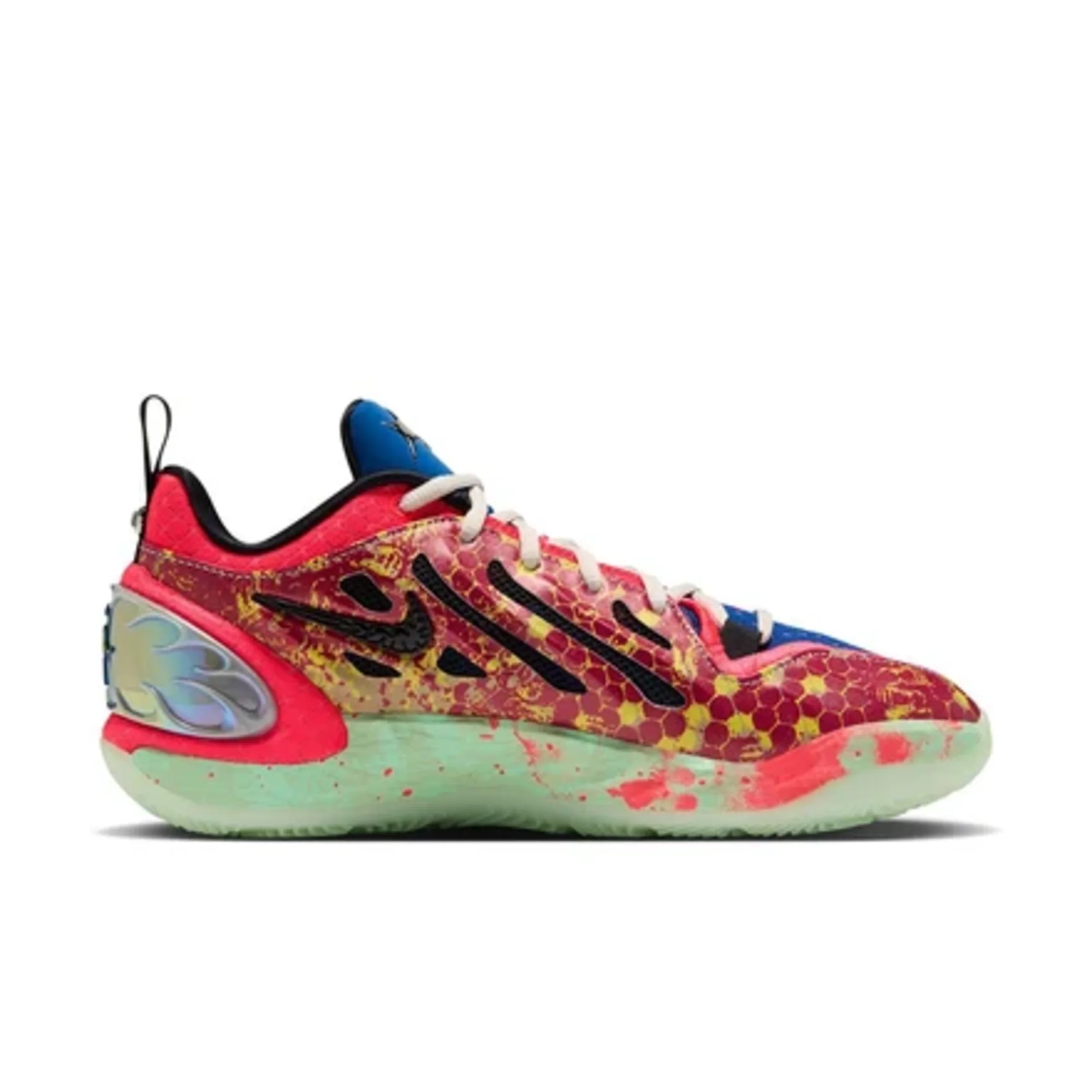 Red and black Nike basketball shoe with a red-and-yellow honeycomb pattern, blue tongue, and translucent green sole on white